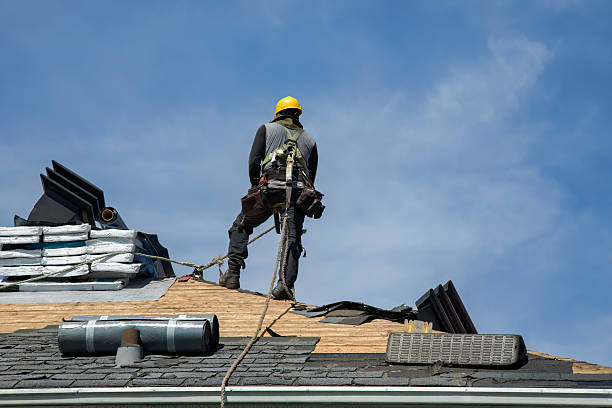 Professional Roof Replacement technician working in Canton, MA